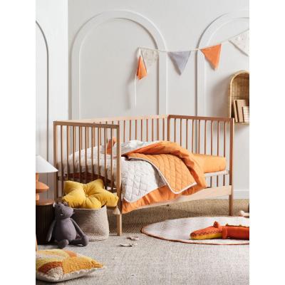 Linen House Smiles All Round Cot Coverlet | Sugar-Apricot 