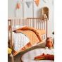 Linen House Smiles All Round Cot Coverlet | Sugar-Apricot 